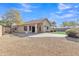 Rear view of house showing a large backyard and patio at 20902 N 36Th Pl, Phoenix, AZ 85050