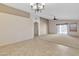 Bright and airy living area with tile flooring and views to kitchen at 20902 N 36Th Pl, Phoenix, AZ 85050