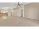 Open concept living area with kitchen view and access to hallway at 20902 N 36Th Pl, Phoenix, AZ 85050