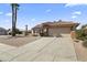 Lovely single-story home with a two car garage, desert landscaping and a tile roof at 23114 N 146Th Dr, Sun City West, AZ 85375