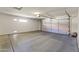 Spacious two car garage with concrete floors and automatic door at 23114 N 146Th Dr, Sun City West, AZ 85375