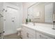 Bright bathroom features glass enclosed shower, floating vanity with sleek fixtures, and modern finishes at 23448 N 76Th Pl, Scottsdale, AZ 85255