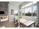 Bright dining area with large windows and stylish pendant light fixture at 23448 N 76Th Pl, Scottsdale, AZ 85255