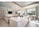 Modern kitchen with stainless steel appliances and a large kitchen island at 23448 N 76Th Pl, Scottsdale, AZ 85255