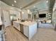 Spacious open concept kitchen featuring an island, stainless steel appliances, and seamless access to the living room at 23448 N 76Th Pl, Scottsdale, AZ 85255