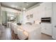 Bright, modern kitchen features a large island with seating and pendant lighting at 23448 N 76Th Pl, Scottsdale, AZ 85255