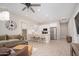 Inviting living room featuring a modern kitchen and comfortable seating area at 23448 N 76Th Pl, Scottsdale, AZ 85255