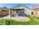 Backyard with patio, gazebo, grass, and playset at 23625 N El Frio Ct, Sun City, AZ 85373