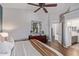 Main bedroom with ensuite bathroom access and large mirror at 23625 N El Frio Ct, Sun City, AZ 85373