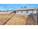 Backyard view showing a portion of the house and surrounding fence at 2641 W Wethersfield Rd, Phoenix, AZ 85029