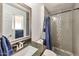 Bathroom features granite vanity and a tiled shower at 2641 W Wethersfield Rd, Phoenix, AZ 85029