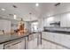 Spacious kitchen with stainless steel appliances and granite countertops at 2641 W Wethersfield Rd, Phoenix, AZ 85029