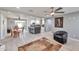 Bright and airy living room with tile floors and ceiling fan at 2641 W Wethersfield Rd, Phoenix, AZ 85029