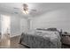 Bright bedroom featuring a king-size bed and hardwood floors at 2650 W Union Hills Dr # 108, Phoenix, AZ 85027