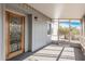 Enclosed patio with glass door and screen windows at 2650 W Union Hills Dr # 108, Phoenix, AZ 85027