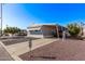 Mobile home with a carport and nicely landscaped yard at 2650 W Union Hills Dr # 108, Phoenix, AZ 85027