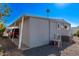 Single wide manufactured home with carport and AC unit at 2650 W Union Hills Dr # 108, Phoenix, AZ 85027