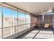 Relaxing screened porch with table and chairs at 2650 W Union Hills Dr # 108, Phoenix, AZ 85027