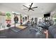 Home gym featuring a variety of equipment, including a treadmill, weight rack, and bench, perfect for staying active at 2752 E Pelican Ct, Gilbert, AZ 85297