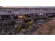 Aerial view of house and backyard at dusk at 29215 N Horton Creek Trl, Rio Verde, AZ 85263