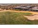 Aerial view of golf course sand trap and homes at 29215 N Horton Creek Trl, Rio Verde, AZ 85263