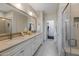 Spa-like bathroom with double vanity and glass shower at 29215 N Horton Creek Trl, Rio Verde, AZ 85263