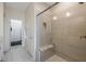 Walk in shower with glass enclosure and built in bench seat at 29215 N Horton Creek Trl, Rio Verde, AZ 85263