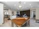 Open dining room with hardwood floors and chandelier at 29215 N Horton Creek Trl, Rio Verde, AZ 85263