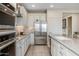 Bright kitchen with stainless steel appliances and island at 29215 N Horton Creek Trl, Rio Verde, AZ 85263