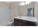 Bathroom boasts double vanity and a bathtub at 29402 W Mitchell Ave, Buckeye, AZ 85396