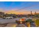 Expansive backyard oasis with a fire pit and mountain views at 29600 N 106Th N Pl, Scottsdale, AZ 85262