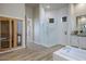 Bathroom features a large walk-in shower, soaking tub and double vanity at 29600 N 106Th N Pl, Scottsdale, AZ 85262