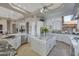 Gourmet kitchen with a large island, custom cabinetry, and granite countertops at 29600 N 106Th N Pl, Scottsdale, AZ 85262