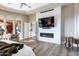 Main bedroom with fireplace, sitting area, and access to the bathroom at 29600 N 106Th N Pl, Scottsdale, AZ 85262