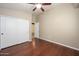 Bedroom with hardwood floors and double door closet at 29606 N 21 Dr, Phoenix, AZ 85085