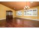 Second view of the formal dining room with hardwood floors at 29606 N 21 Dr, Phoenix, AZ 85085