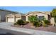 Two-car garage and well-maintained landscaping at 29606 N 21 Dr, Phoenix, AZ 85085