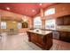 Open kitchen with large island and views to living room at 29606 N 21 Dr, Phoenix, AZ 85085