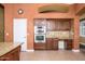 Kitchen with built-in oven, microwave, and granite countertops at 29606 N 21 Dr, Phoenix, AZ 85085