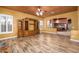 Living room with hardwood floors and built-in entertainment center at 29606 N 21 Dr, Phoenix, AZ 85085