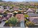 Aerial view of a house with red tile roof, and a nicely landscaped yard at 29762 N 69Th Ln, Peoria, AZ 85383