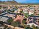 Aerial view of a house in a residential neighborhood with mountain views at 29762 N 69Th Ln, Peoria, AZ 85383