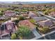 Aerial view of house, neighborhood, and mountain views in the background at 29762 N 69Th Ln, Peoria, AZ 85383