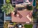 Directly above view of house with red tile roof and landscaping at 29762 N 69Th Ln, Peoria, AZ 85383