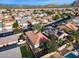 Aerial view of house and neighborhood with desert mountain views at 29762 N 69Th Ln, Peoria, AZ 85383