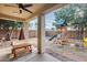 Covered patio with playset and spacious backyard at 29762 N 69Th Ln, Peoria, AZ 85383