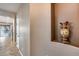 Entryway with tile floors and decorative vase; view to kitchen at 29762 N 69Th Ln, Peoria, AZ 85383