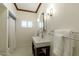 Clean bathroom with pedestal sink, shower/tub combo, and updated fixtures at 320 W Cypress St, Phoenix, AZ 85003