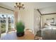 Bright dining area with chandelier and view to entryway at 320 W Cypress St, Phoenix, AZ 85003