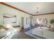 Spacious living area featuring a sectional sofa and wood accent wall at 320 W Cypress St, Phoenix, AZ 85003